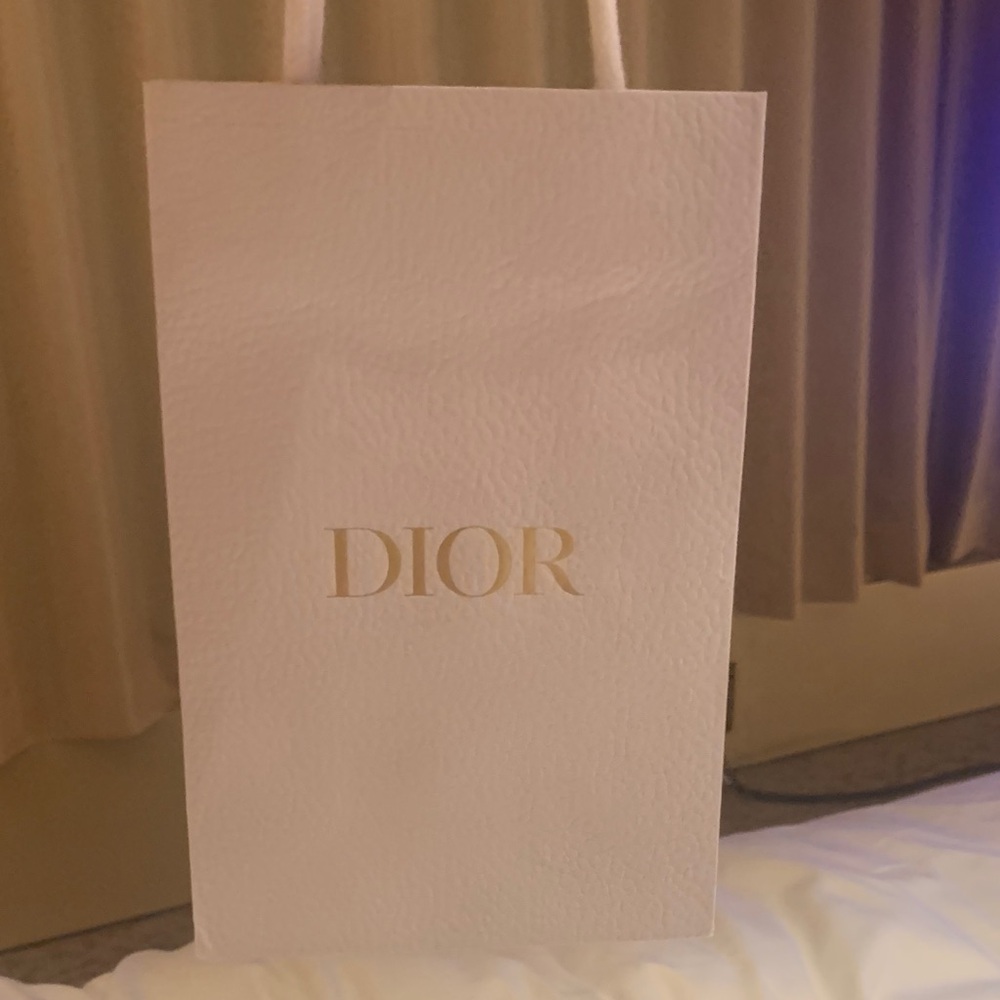 Authentic rare Dior Cream Luxury Bag paper with golden Dior letter, textured